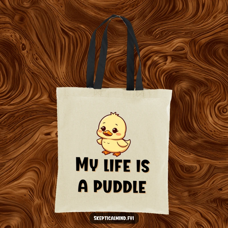 Funny duckling tote bag showing a small duckling waddling with a confused and amused look, perfect for shopping.